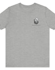 front view of an athletic heather colored fabric patriotic shirt with americantees.us logo on front and American flag in shape of a Christian cross with pledge of allegiance surrounding image on back