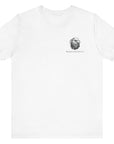 White color fabric patriotic shirt front view has an americantees.us logo with eagle head , rear view has distressed American flag with modern sporting rifle with the log Pro Armis Libertas meaning For Arms, Freedom