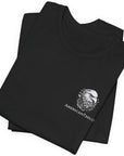 front view of black color fabric folded patriotic shirt with americantees.us logo on front and Thomas Jefferson quote on back.