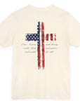 rear view of a natural colored fabric patriotic shirt with americantees.us logo on front and American flag in shape of a Christian cross with pledge of allegiance surrounding image on back