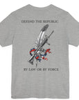 Back view of an athletic heather colored t-shirt with a graphic design of a rifle crossed with a quill fountain pen and an American flag ribbon, with the quote Defend the Republic by law or by force. Patriotic Shirts. logo design on front