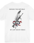 Back view of an white colored t-shirt with a graphic design of a rifle crossed with a quill fountain pen and an American flag ribbon, with the quote Defend the Republic by law or by force. Patriotic Shirts. logo design on front.