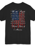 rear view of black colored fabric patriotic shirt with American flag background and the preamble of the united states constitution on the back pf shirt, front of shirt has americantees.us logo