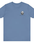 patriotic shirt front view lavender blue color fabric logo on front graphic on back with minuteman soldier and phrase rebellion is our heritage, American t-shirt