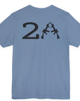rear view of a patriotic a steel blue colored fabric shirt with americantees.us logo on front and 2A on the back with stacked rifles forming the A