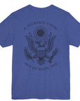 rear view of a heather true royal blue colored fabric patriotic shirt with an americantees.us logo on front and the great seal of the united states on the back