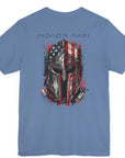 rear view lavender blue color fabric tee with americantees.us logo on front with spartan helmet covered with american flag and motto molon labe patriotic shirt