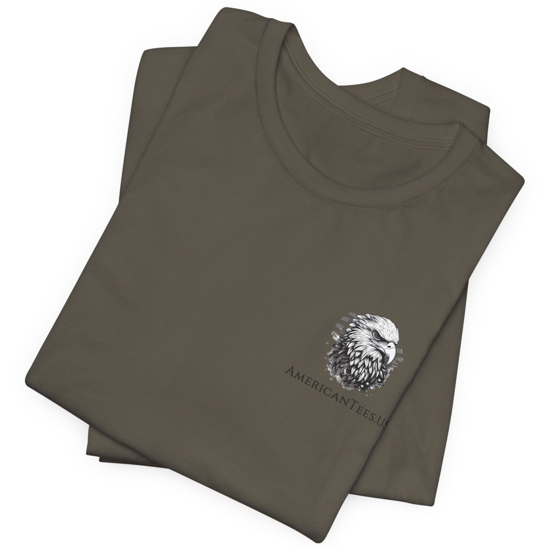 Army green color fabric folded patriotic shirt front view has an americantees.us logo with eagle head , rear view has distressed American flag with modern sporting rifle with the log Pro Armis Libertas meaning For Arms, Freedom