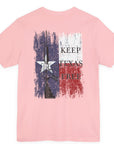 rear view of pink colored fabric shirt with americantees.us logo on front and Texas flag with rifle and Keep Texas Free writing on back