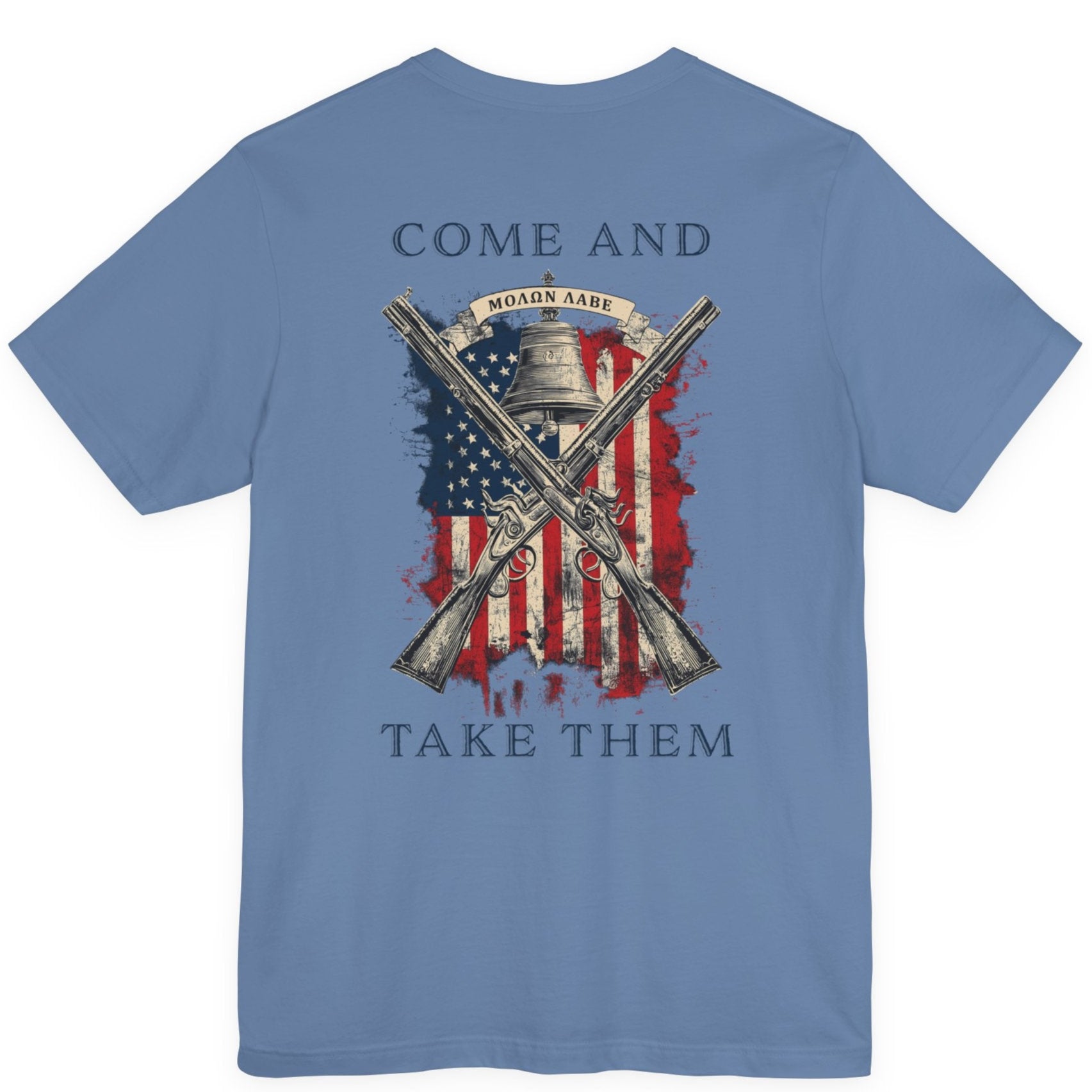 rear view of patriotic shirt lavender blue color fabric tee with logo on front and american flag with liberty  bell and crossed rifles on back, motto that states Come and Take Them  and molon labe on scroll