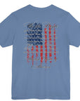 rear view of lavender blue colored fabric patriotic shirt with American flag background and the preamble of the united states constitution on the back pf shirt, front of shirt has americantees.us logo