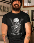 anarchy-strings-punk-black-tee-mockup-of-a-bearded-man-with-tattoos-wearing-a-t-shirt-indoors