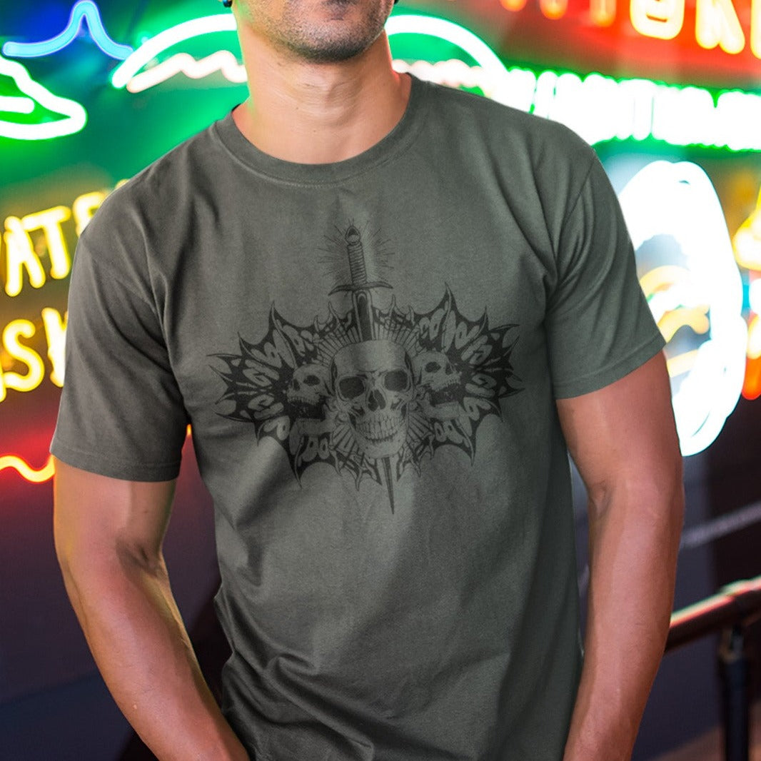 blade-and-bone-punk-rock-asphalt-t-shirt-mockup-of-a-man-wearing-a-round-neck-t-shirt-against-neon-signs