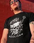 boneyard-ballad-punk-rock-black-t-shirt-mockup-of-a-tough-looking-man-posing-in-front-of-a-red-brick-wall
