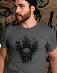 dark-skull-with-wings-graphic-asphalt-t-shirt-mockup-featuring-a-bearded-man-with-a-cap-by-a-graffiti-wall