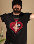 lucky-13-mans-ruin-black-t-shirt-rockabilly-mockup-of-a-tattooed-man-wearing-a-t-shirt-indoors