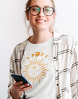 moon-phase-with-sun-white-t-shirt-tee-mockup-of-a-college-student-studying-at-home