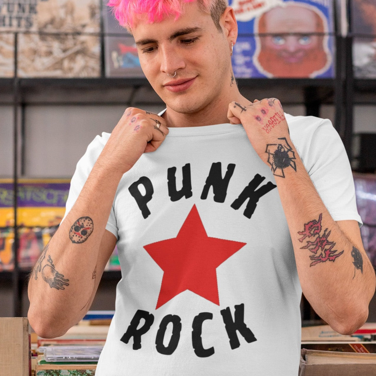 punk-rock-red-star-white-t-shirt-mockup-featuring-a-man-with-pink-hair-at-a-music-store