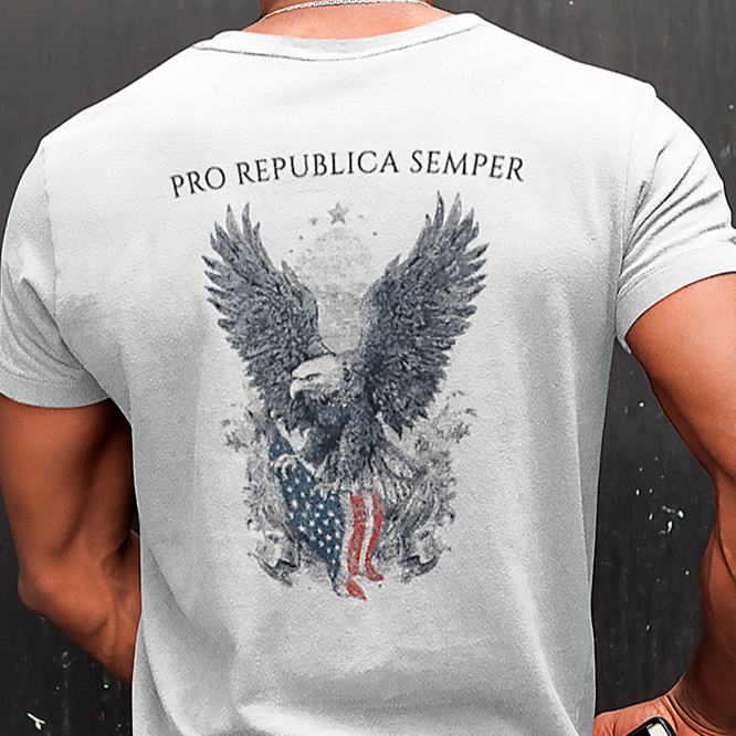 back-of-a-black-man-wearing-a-t-shirt-mockup-while-facing-a-wall-Patriotic Shirts Pro Libertas Semper Flag Eagle Tee, white, back side, featuring a bold eagle clutching an American flag with scrollwork on a unisex 100% cotton shirt, ideal for American pride