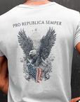 back-of-a-black-man-wearing-a-t-shirt-mockup-while-facing-a-wall-Patriotic Shirts Pro Libertas Semper Flag Eagle Tee, white, back side, featuring a bold eagle clutching an American flag with scrollwork on a unisex 100% cotton shirt, ideal for American pride