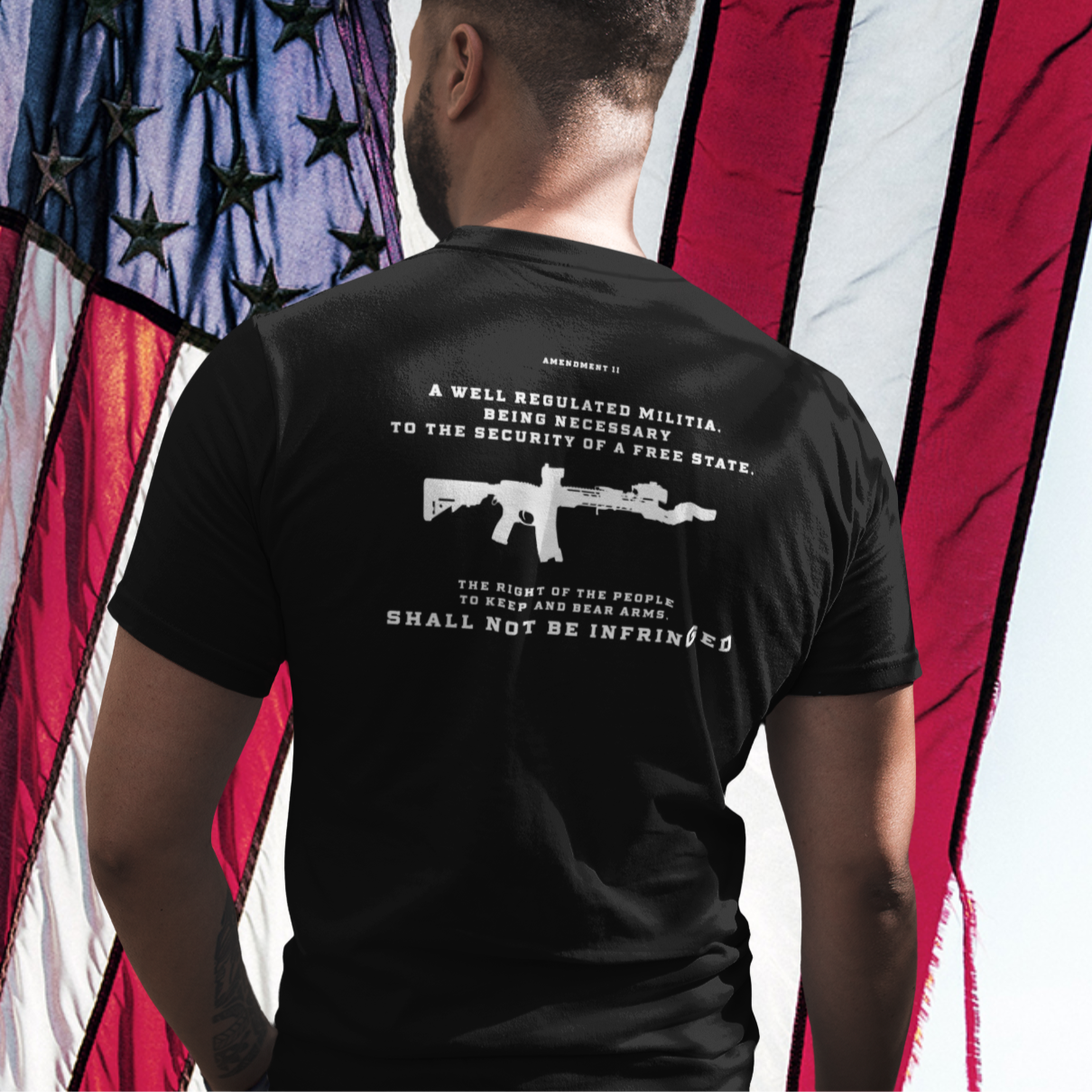 back-view-tshirt-mockup-of-a-man-facing-a-house-and-a-tree-Second Amendment Patriotic Shirt with Rifle and Text Design, bill of rights, black colored shirt, rear view