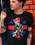 union-jack-black-punk-t-shirt-mockup-featuring-a-stylish-man-leaning-on-a-brick-wall