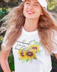 a-good-heart-keeps-you-beautiful-white-t-shirt-womens-sunflower-mockup-of-a-happy-young-woman-strolling-at-a-park