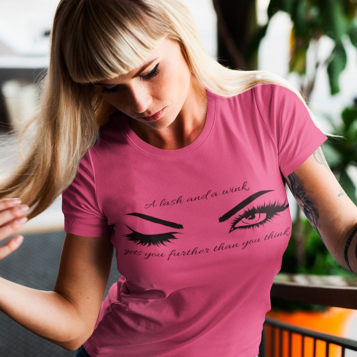 a-lash-and-a-wink-gets-you-further-than-you-think-berry-t-shirt-womens-lashes-mockup-featuring-a-woman-grabbing-her-hair