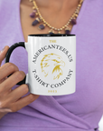 american-tees-us-logo-text-glossy-mug-11-oz-coffee-color-rim-mug-mockup-of-a-tattooed-woman-leaning-on-a-bar