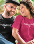 americantees-us-austin-tx-black-and-berry-t-shirts-unisex-mockup-featuring-a-happy-couple-sitting-on-a-bench-and-hanging-out