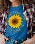 be-true-be-you-be-kind-be-brave-heather-true-royal-t-shirt-sunflower-womens-mockup-of-a-curly-haired-woman-wearing-a-tee-under-a-flannel