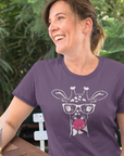 bubblegum-giraffe-team-purple-t-shirt-womens-style-mom-having-a-tea-while-wearing-a-tee