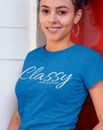classy-until-kickoff-heather-true-royal-t-shirt-football-soccer-womens-mockup-of-a-kinky-haired-woman-leaning-on-a-red-metal-door
