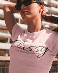 classy-until-the-puck-drops-pink-t-shirt-hockey-womens-mockup-of-a-girl-with-a-ponytail-and-sunglasses-on-the-street