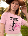 country-girl-with-lasso-pink-t-shirt-cowgirl-bella-canvas-t-shirt-mockup-of-a-woman-posing-in-nature