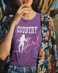 country-girl-with-lasso-team-purple-t-shirt-cowgirl-tee-mockup-featuring-a-hipster-girl-posing-against-a-cactus