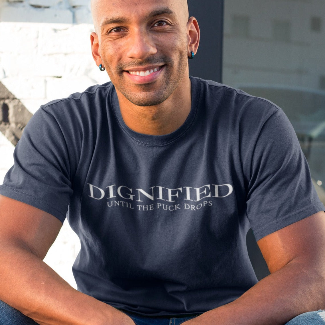 dignified-until-the-puck-drops-navy-t-shirt-mens-sports-hockey-mockup-of-a-happy-man-sitting-on-a-stairway