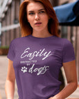 easily-distracted-by-dogs-team-purple-t-shirt-womens-animal-lover-mockup-featuring-a-serious-long-haired-woman