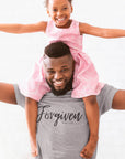 forgiven-luke-5-20-athletic-heather-grey-t-shirt-unisex-inspiring-christian-mockup-of-a-happy-dad-carrying-his-daughter-on-his-shoulders