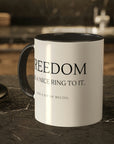 freedom-has-a-nice-ring-to-it-and-a-bit-of-recoil-glossy-mug-11-oz-2a-mockup-on-a-wooden-table