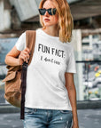 fun-fact-i-dont-care-funny-white-t-shirt-womens-sarcastic-mockup-of-a-woman-wearing-a-round-neck-t-shirt-in-an-urban-setting