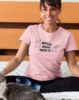 gettin-piggy-with-it-pink-t-shirt-funny-dancing-pigs-portrait-of-a-happy-cat-owner-wearing-a-t-shirt-mockup-on-bed