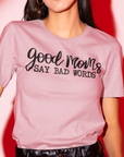 good-moms-say-bad-words-pink-t-shirt-womens-tee-bella-canvast-mockup-of-a-woman-posing-against-a-red-lighting