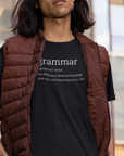 grammar-the-difference-between-knowing-your-shit-and-knowing-youre-shit-team-purple-t-shirt-bella-canvas-tee-mockup-of-a-man-with-long-hair-posing-on-a-street
