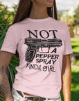 gun-girl-not-a-pepper-spray-kind-of-girl-pink-t-shirt-mockup-of-a-stylish-tattooed-woman-at-a-park