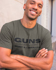 guns-only-have-two-enemies-rust-and-liberals-army-green-t-shirt-2a-second-amendment-mockup-of-a-smiling-man-wearing-a-tee-on-the-street