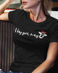 hay-girl-hay-black-t-shirt-cowgirl-womens-mockup-of-a-stylish-woman-sitting-in-the-sunlight