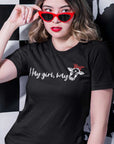 hay-girl-hay-round-neck-t-shirt-mockup-of-a-woman-with-sunglasses-posing-by-a-checkered-background
