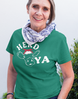 herd-ya-heather-kelly-green-t-shirt-cowgirl-senior-woman-wearing-a-round-neck-tee-mockup-against-plants