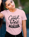 i-have-a-good-heart-but-this-mouth-pink-t-shirt-women-sarcastic-funny-mockup-featuring-a-young-woman-grabbing-her-hair